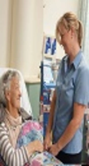 The Role of Heath Team in Coping Process of Family Caregivers with Patients Under Hemodialysis: A Qualitative Study
